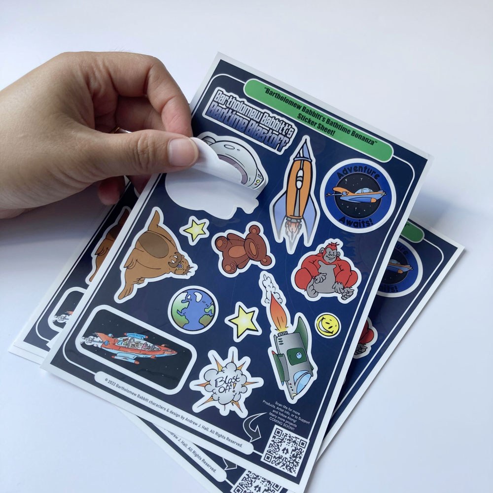 Impresión de pegatinas infantiles con un libro.